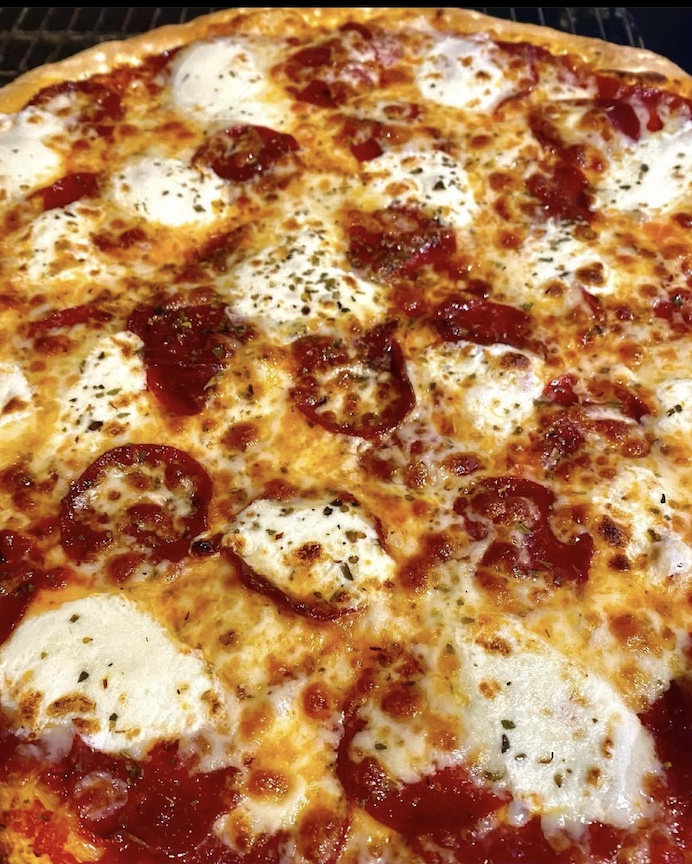 Fresh pepperoni pizza at LA Gourmet Pizza Dallas